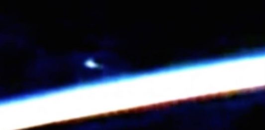 ISS captures UFO hovering Earth.