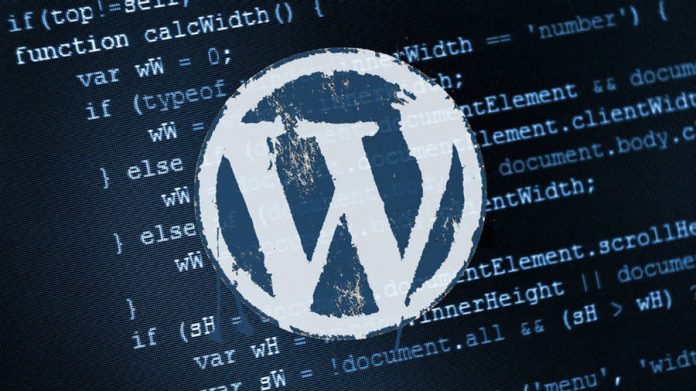 WordPress Logo on top of a sheet of code.