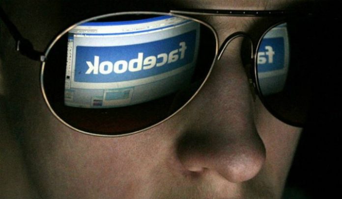 Facebook logo reflected on shades