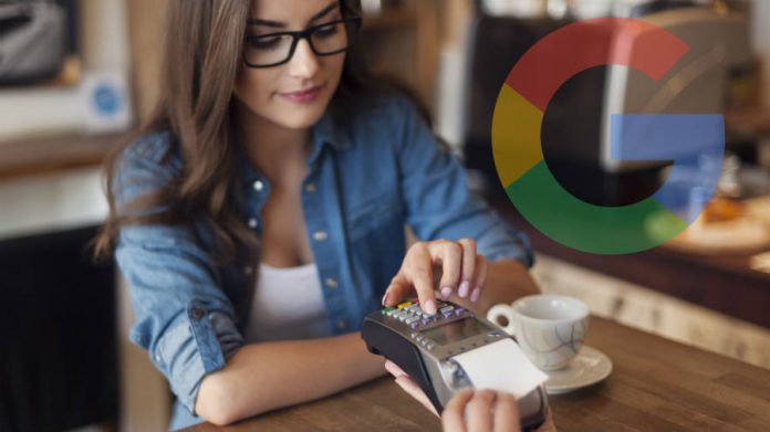 Woman paying with a debit card