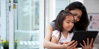 Mother and daughter using a tablet