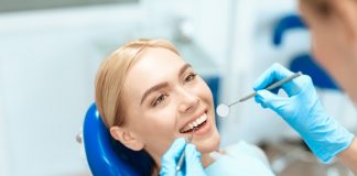 Woman Getting Dental Treatment