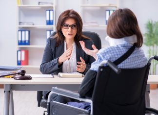 Injured Employee Talking to Lawyer