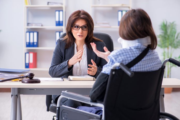 Injured Employee Talking to Lawyer