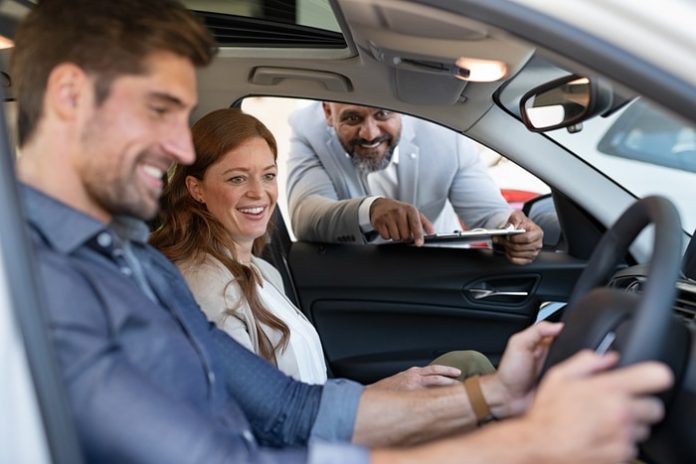 Couple Buying New Car