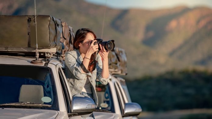 female-photographer-taking-pictures Female Photographer Taking Pictures