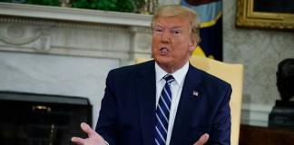 For the First Time Ever, President Trump Wears Face Mask at Military Hospital